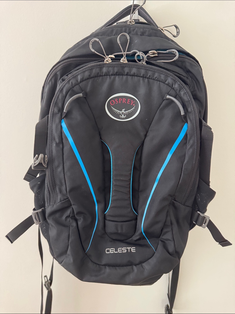 Osprey Black Backpack with Bright Blue Interior